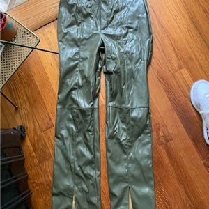 Faux green leather pants slits on front